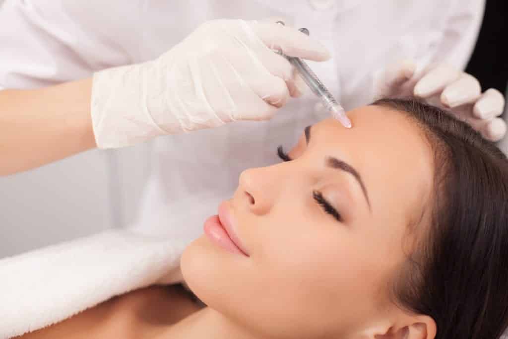 woman receiving Botox treatment