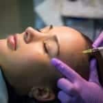 Botox being injected in forehead