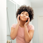 young-female-applying-retinol-to-her-face